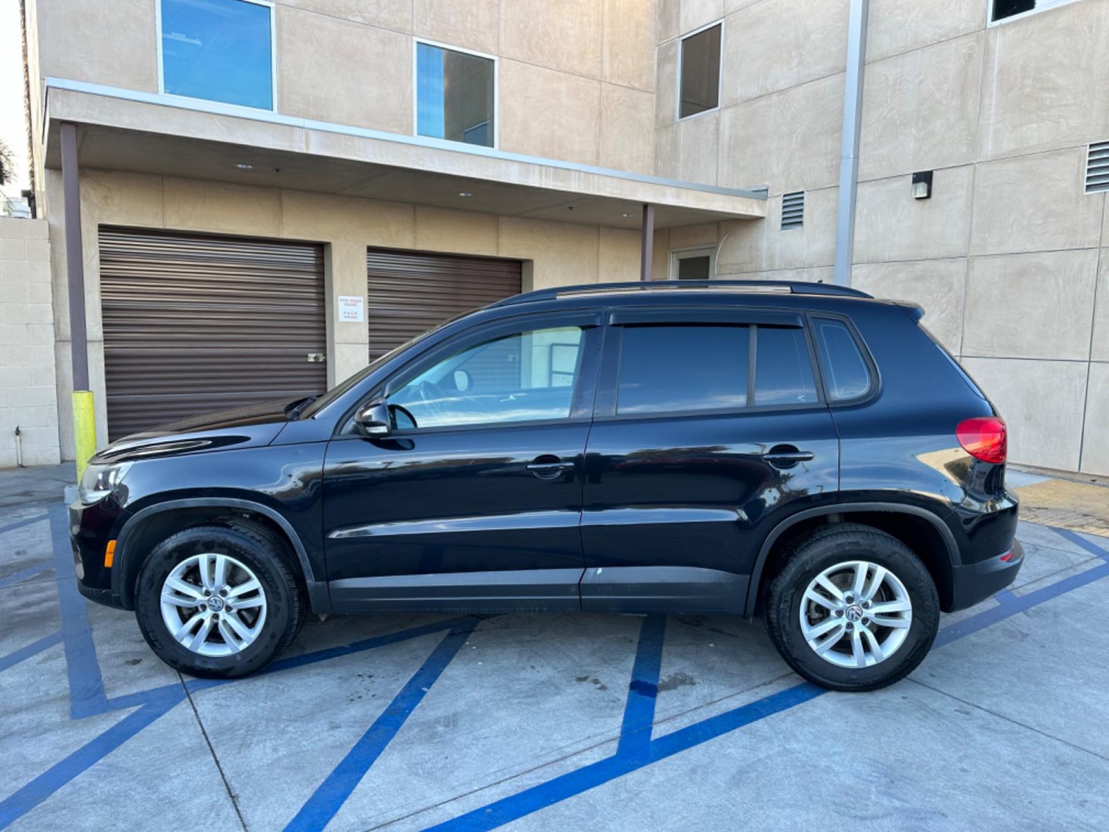 2016 Black /Black Volkswagen Tiguan (WVGAV7AX5GW) , AUTOMATIC transmission, located at 30 S. Berkeley Avenue, Pasadena, CA, 91107, (626) 248-7567, 34.145447, -118.109398 - Crown City Motors is a used “Buy Here Pay Here” car dealer in Pasadena CA. “Buy Here Pay Here” financing, means that when you purchase your vehicle from our dealership, that you make the payments to the dealership as well. We do not need the banks approval to get you approved for a used auto - Photo #2